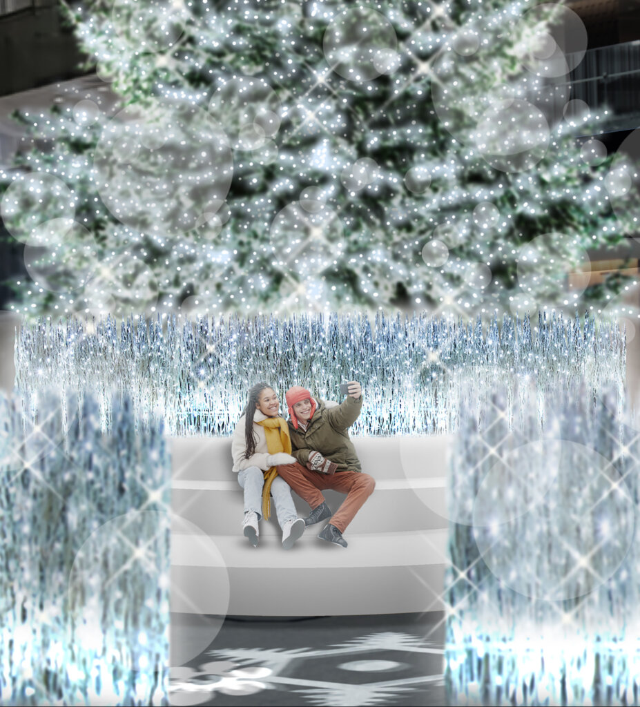 WHITE KITTE シンボルツリーで写真撮影する男女