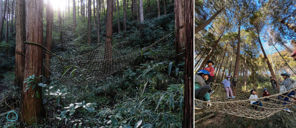 巨大ハンモックで遊ぶこども