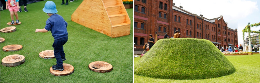 切り株で遊ぶ子ども 芝生の小山