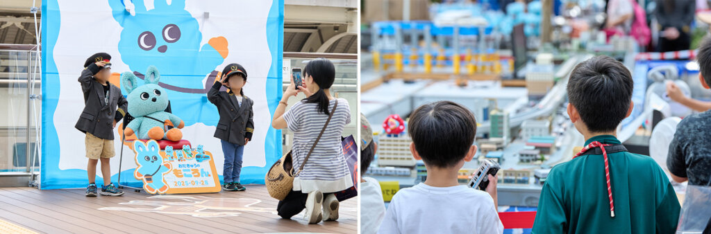 制服を着て撮影 Nゲージを見る子ども